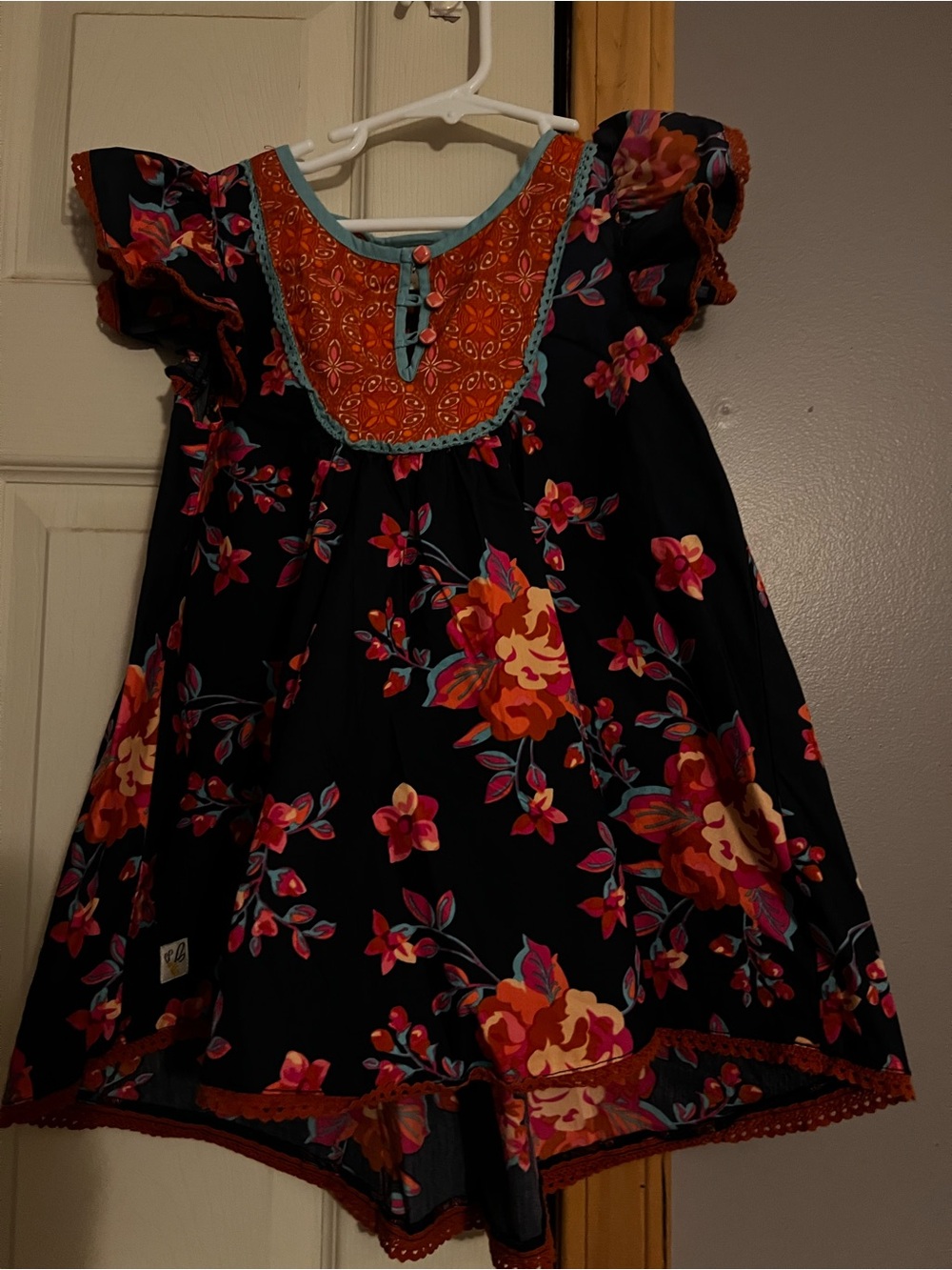 Wild flowers top with ruffled hem button detailed bottoms, size 6/8 Navy/orange